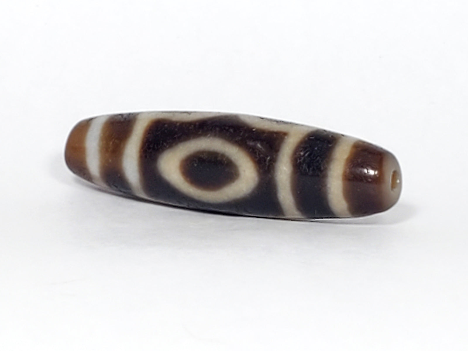 The Three-Eye Dzi Bead: Symbolism and Significance