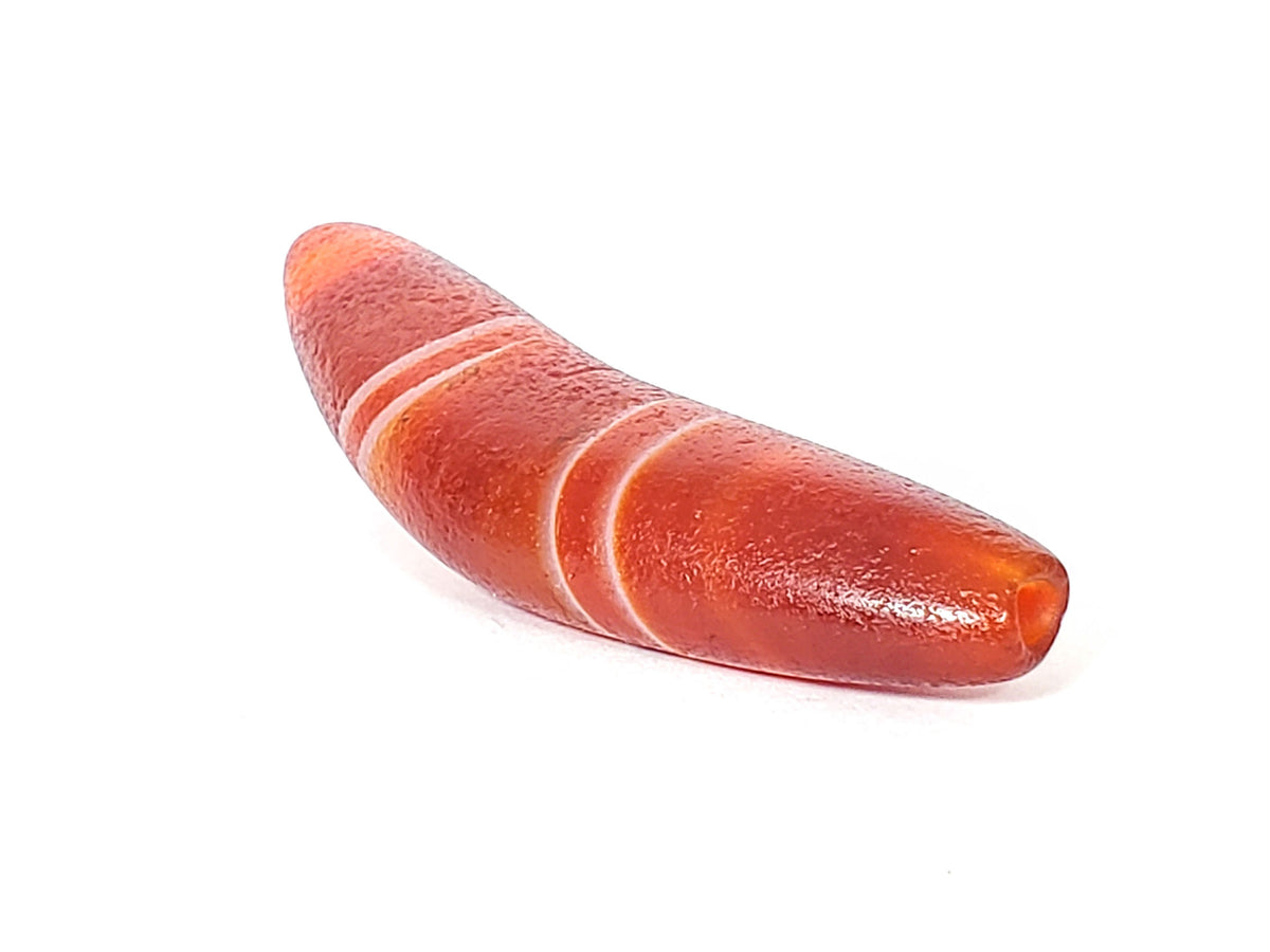 Natural banded agate dzi bead with bow shape and white stripe bands on red-orange stone