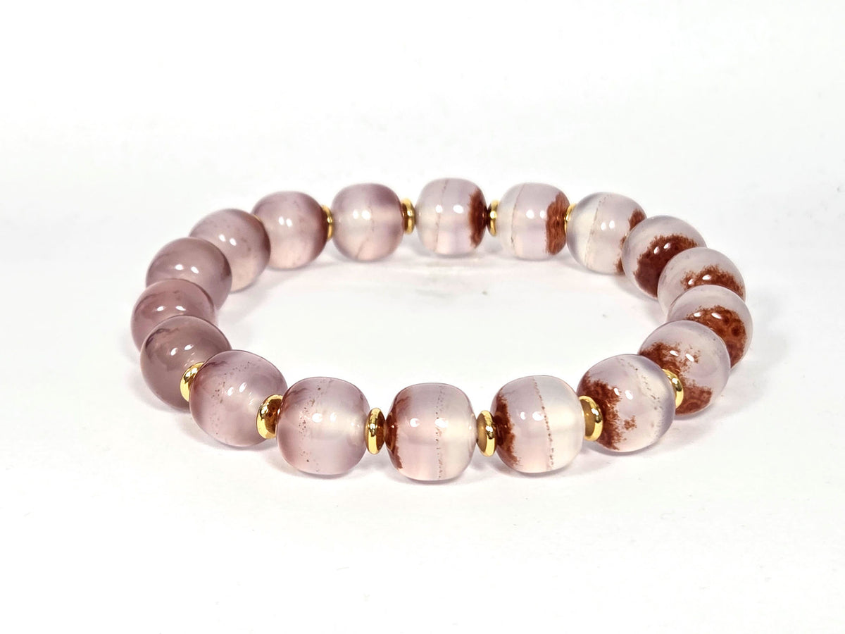 N-020726-CB3 chalcedony bracelet, pale blush-lavender, bold russet cinnabar zones, gold spacers, 10×9mm, unretouched