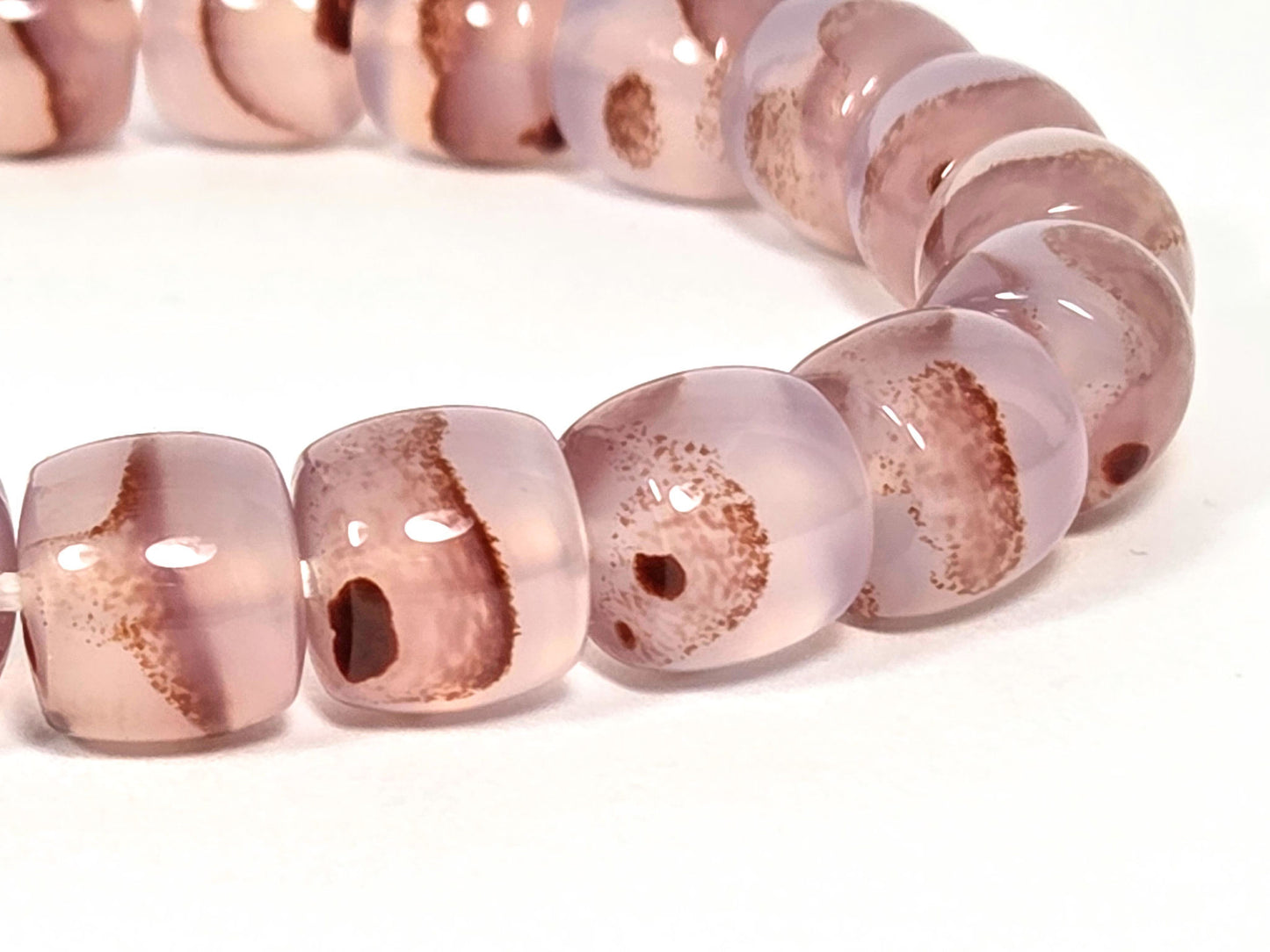 N-030526-CB macro, dense cinnabar bloodspot masses and organic banding, dusty mauve-rose agate, unretouched
