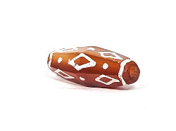 Ancient nine-eye carnelian dzi bead, hexagonal shape, white diamond and dot motifs on reddish-brown agate, aged patina
