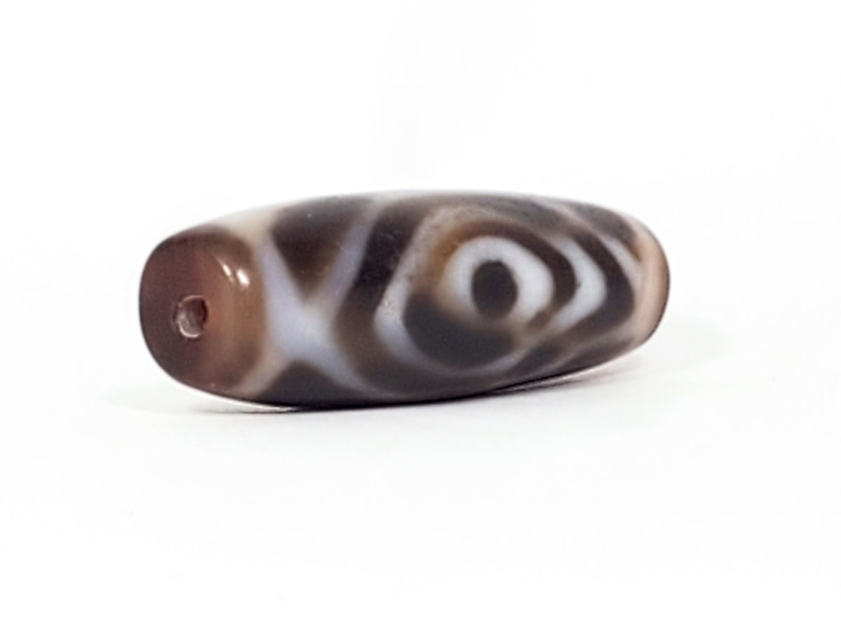 Ancient Tibetan dzi bead double heaven's gate motif brown agate white eyes bloodspot drill hole patina