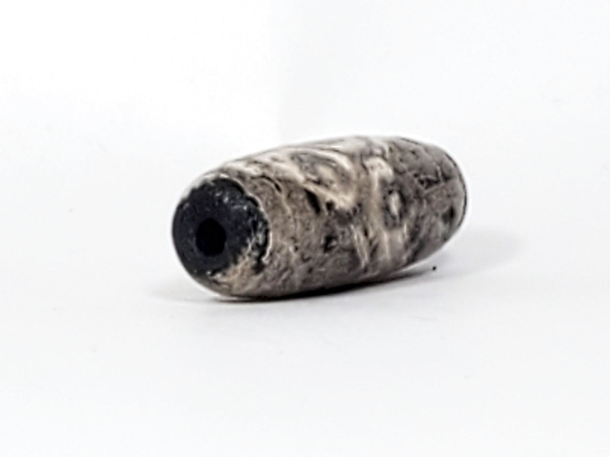 Ac-071026-12EL ancient twelve eye lotus dzi angled drill end A pitch-black interior clean hole unretouched