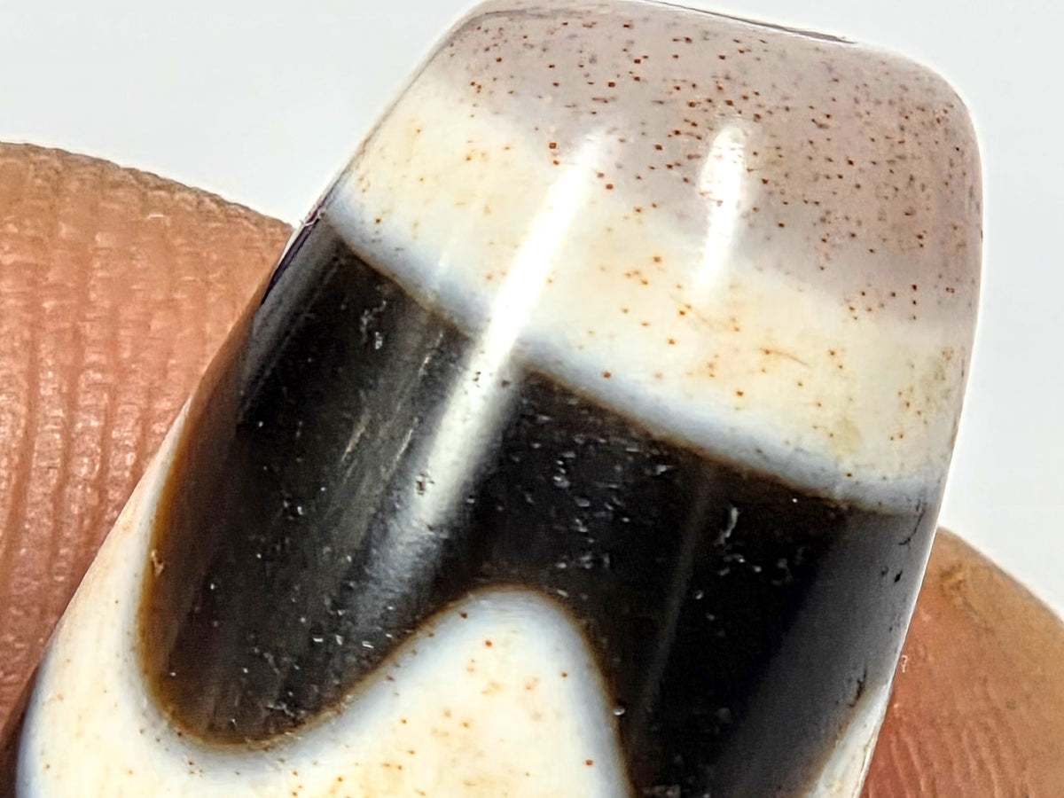Antique Tibetan Dzi bead four activities cross motif black white agate bloodspots aged patina cabochon