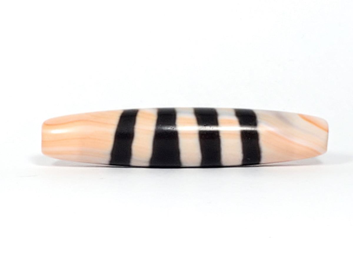Antique Nepalese seven stripe chung dzi bead, peach agate, black etched bands, polished elongated barrel form