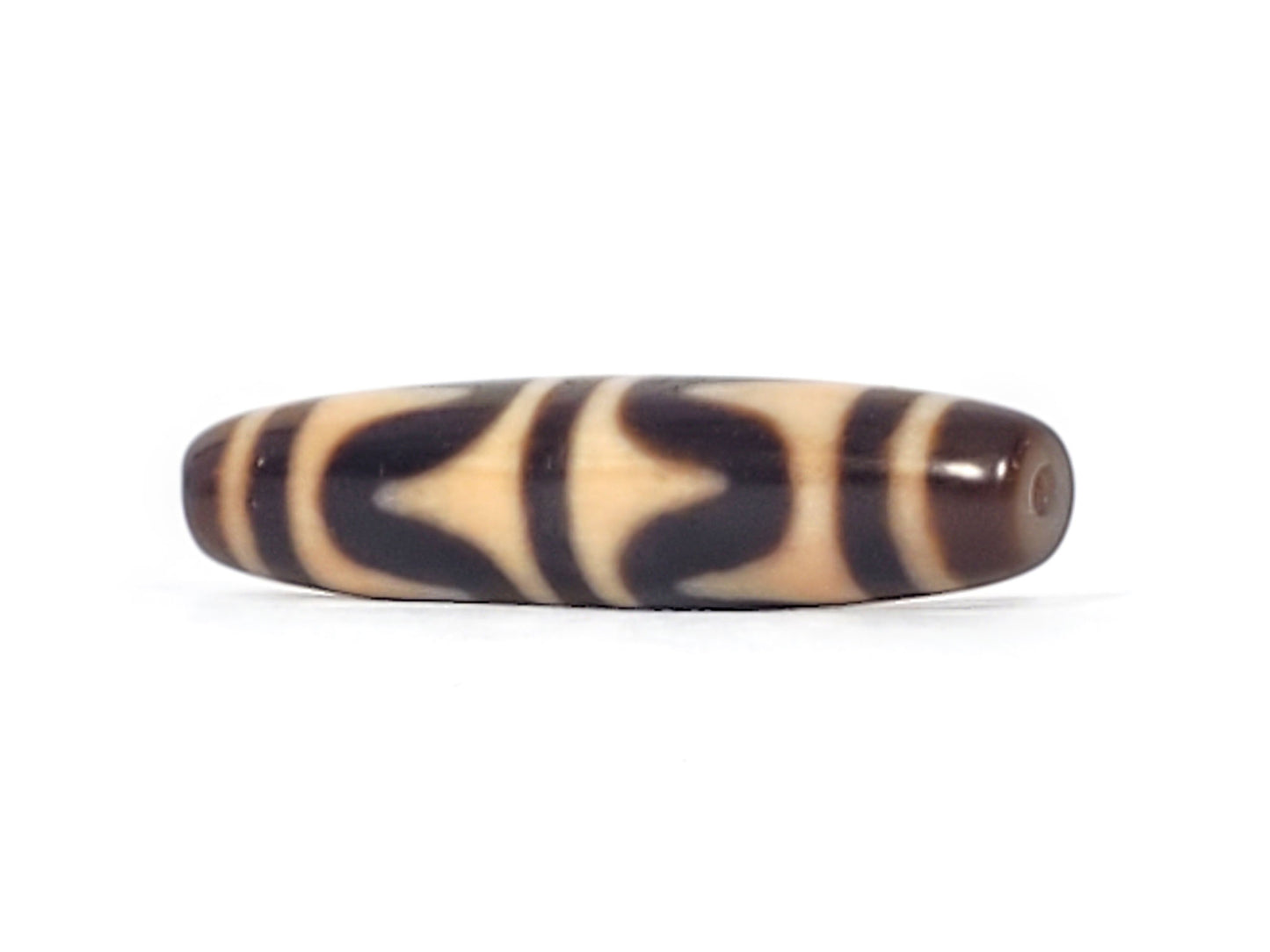 Opposite end of antique Tibetan Double Wave dzi bead showing centred drill hole in brown agate cap, At-052526-DW4