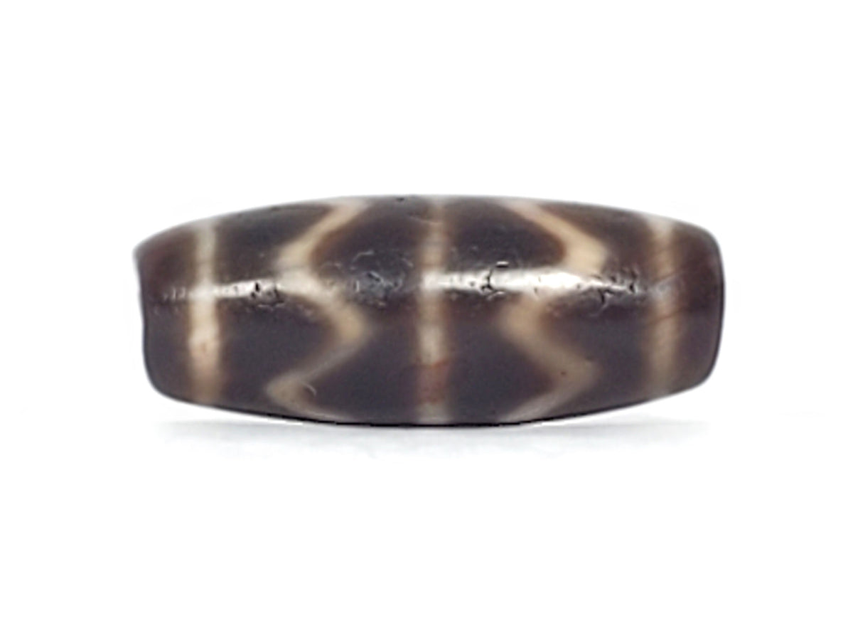 At-102524-DTT end A terracotta-russet cap cool charcoal-brown body spindle dzi unretouched