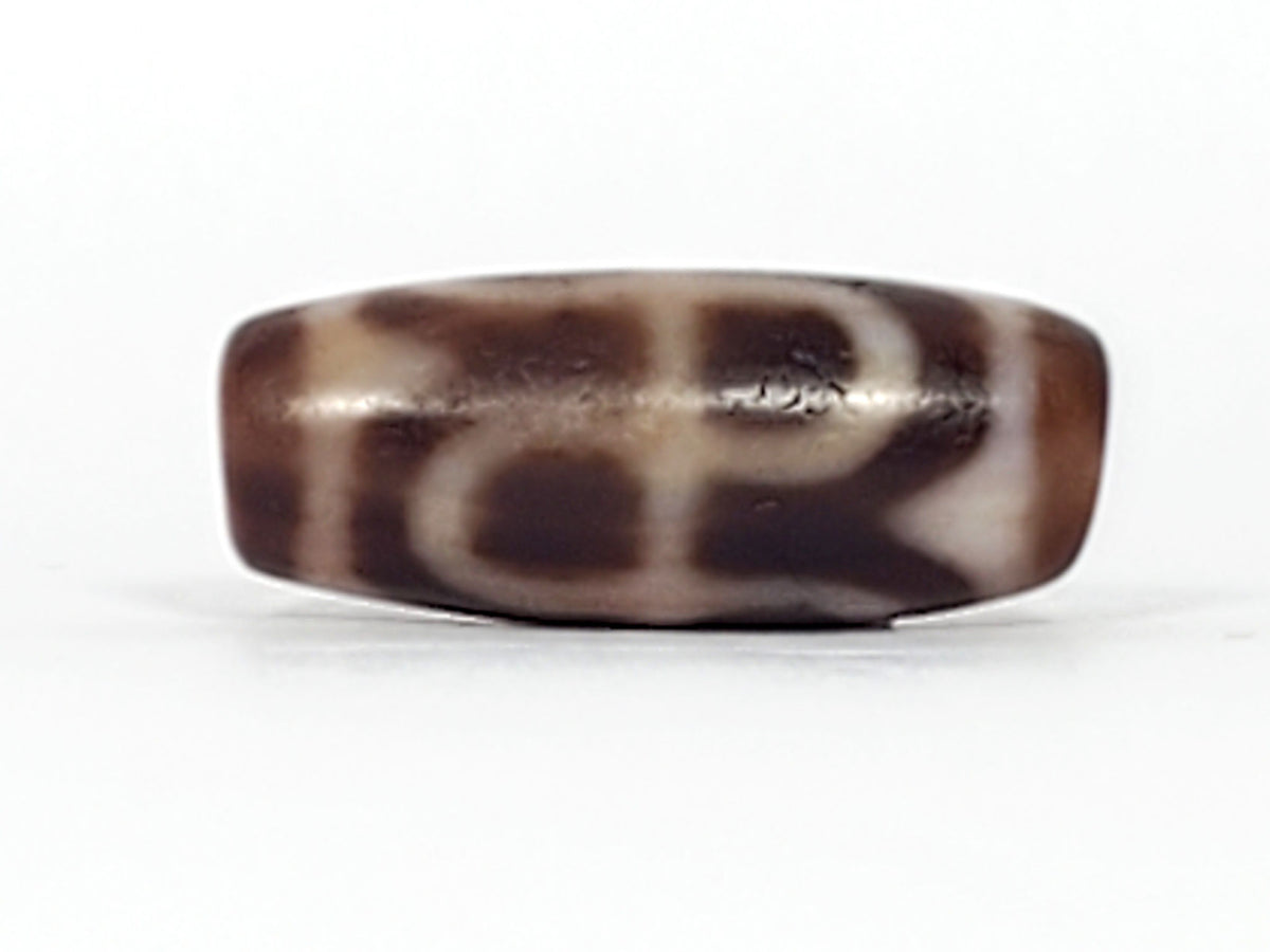 At-091124-TTL end B warm medium brown cap compact barrel full profile dzi unretouched