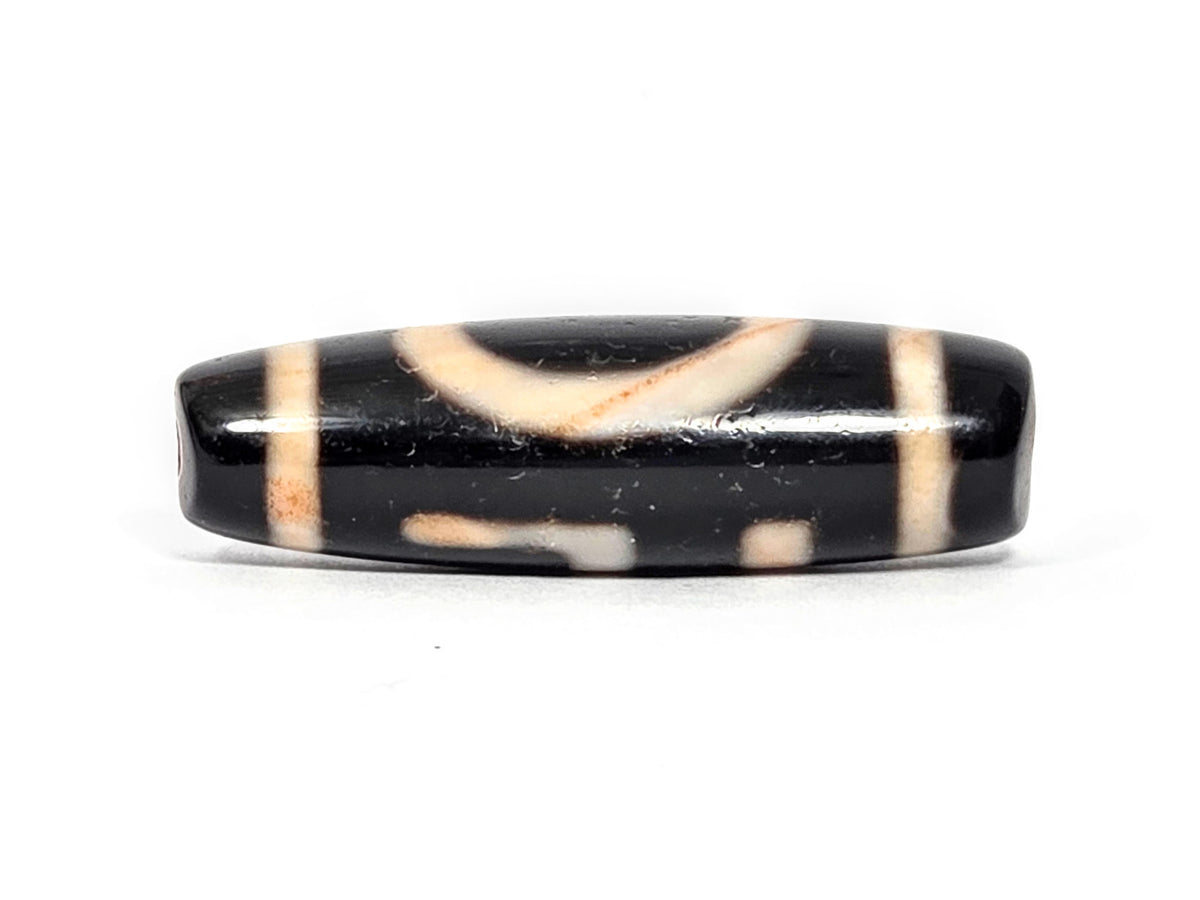 At-072326-1ESWBS antique one eye yungdrung dzi pitch-black agate transitional face swastika upper arc below unretouched