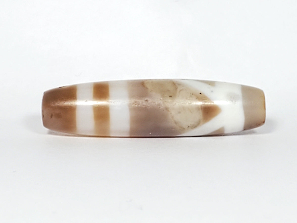 Ancient double mountain motif dzi bead, brown and white banded agate, elongated barrel shape, natural patina, polished surface
