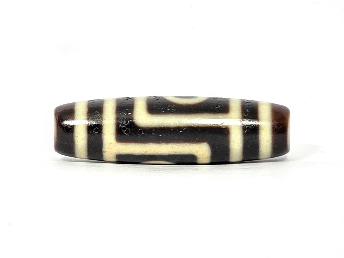 Two-eye dzi bead, dark brown and cream striped agate, polished surface, 39.9mm