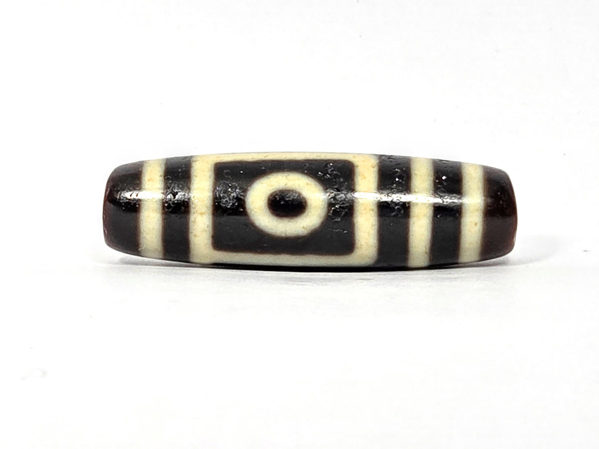 Two-eye dzi bead, dark brown agate with cream striping, drilled hole, 39.9×11.6mm