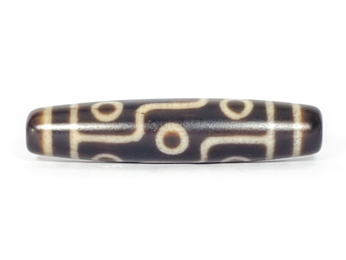 Nine-eye dzi bead, dark brown agate with cream patterns, 58mm, polished surface with visible drill holes