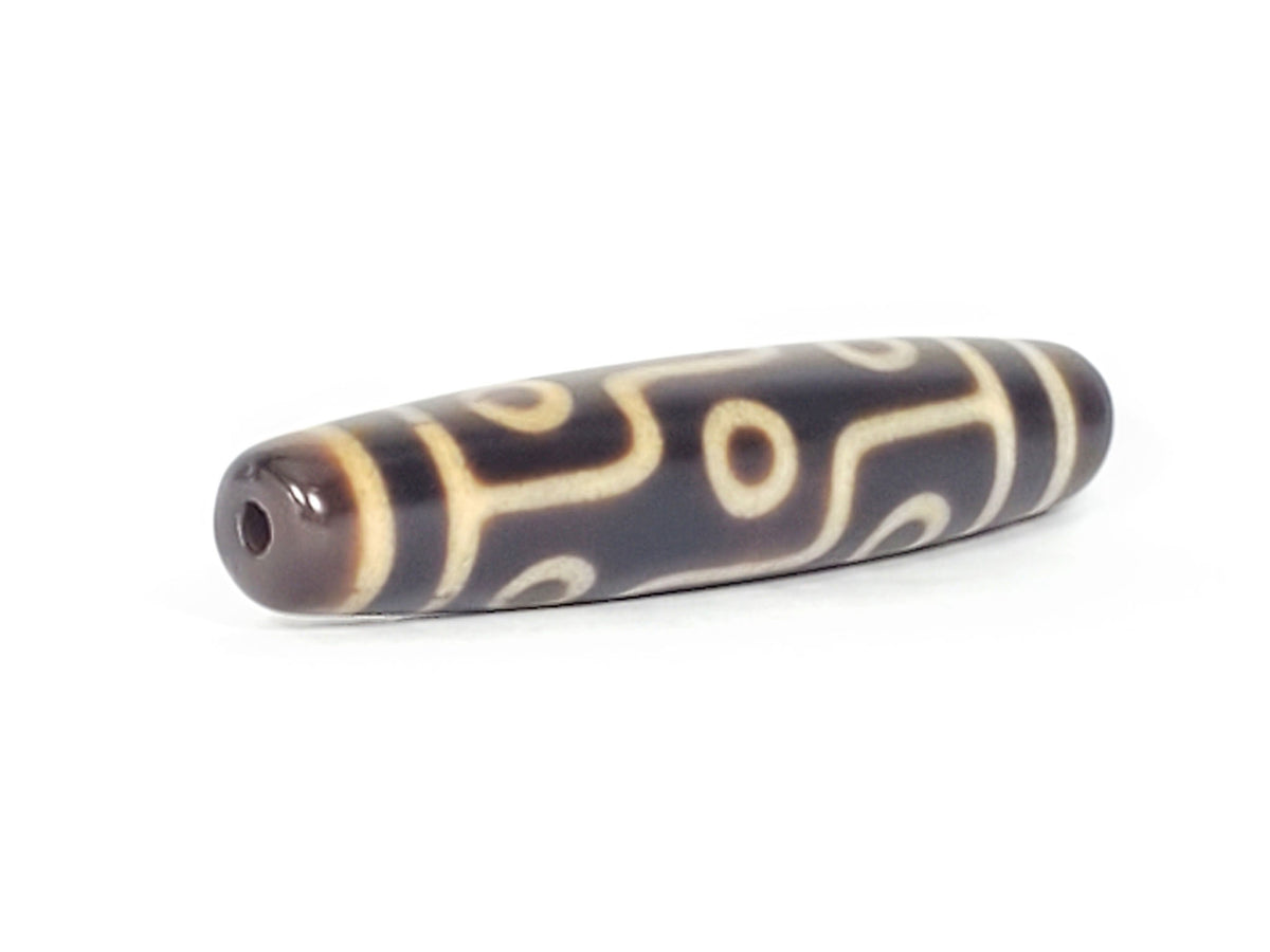Nine eye dzi bead, dark brown agate with cream patterns, 58mm, drilled hole visible