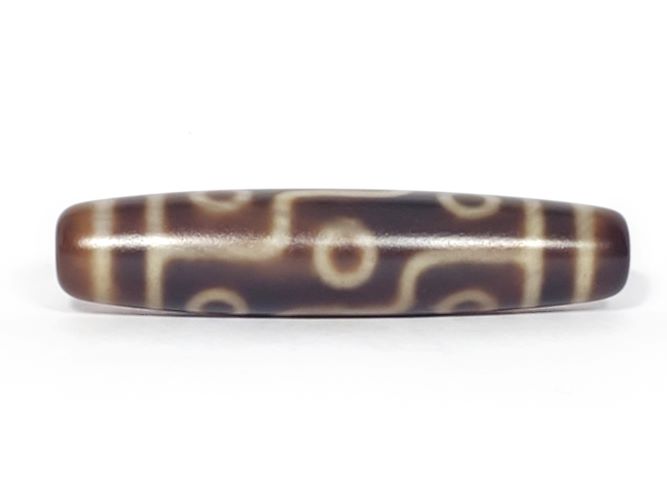 Nine-eye dzi bead with brown agate and cream stripe pattern, traditional Tibetan design