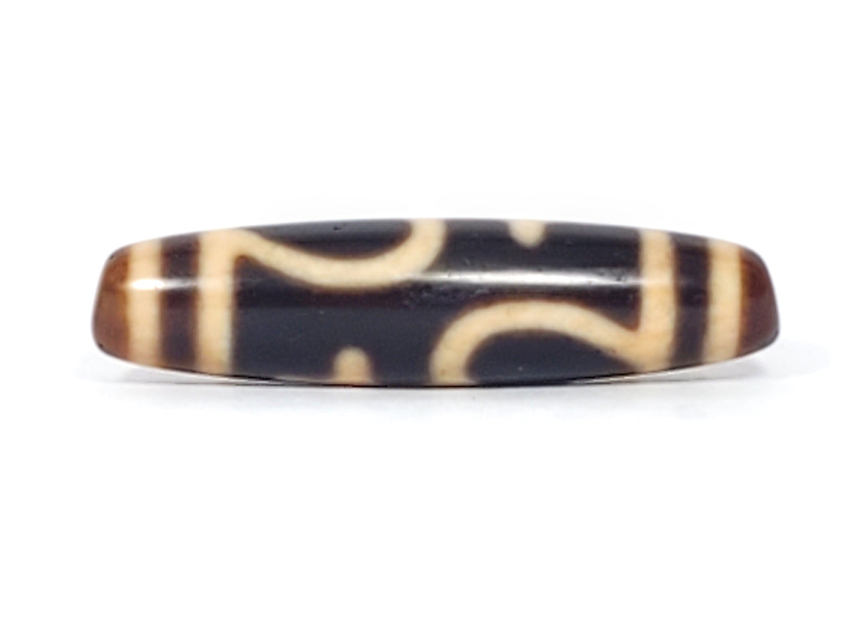 Antique Tibetan dzi bead treasure vase motif, dark agate, cream etched pattern, cylindrical oval shape, aged patina