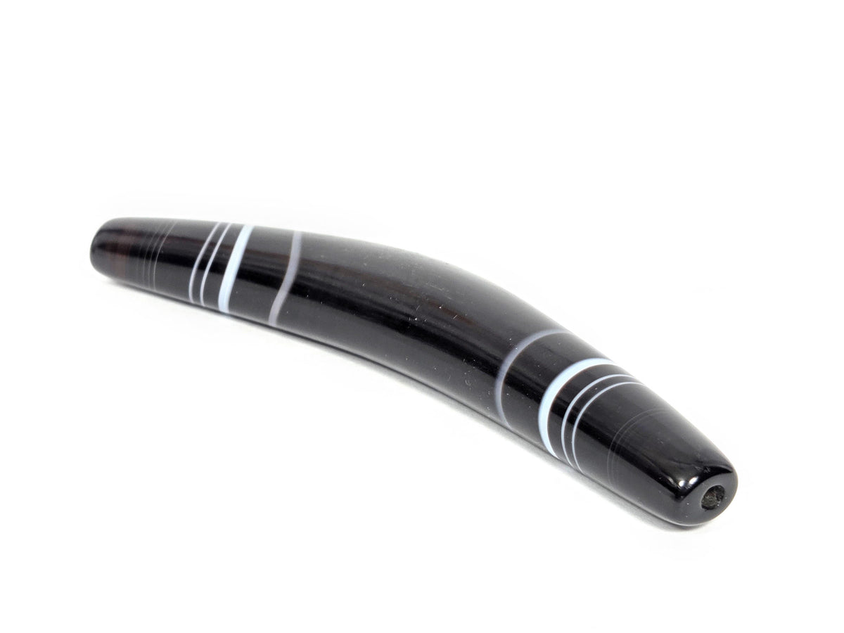At-N-071126-BOW three-quarter view, wider tapered drill-hole end, pitch-black banded agate, unretouched