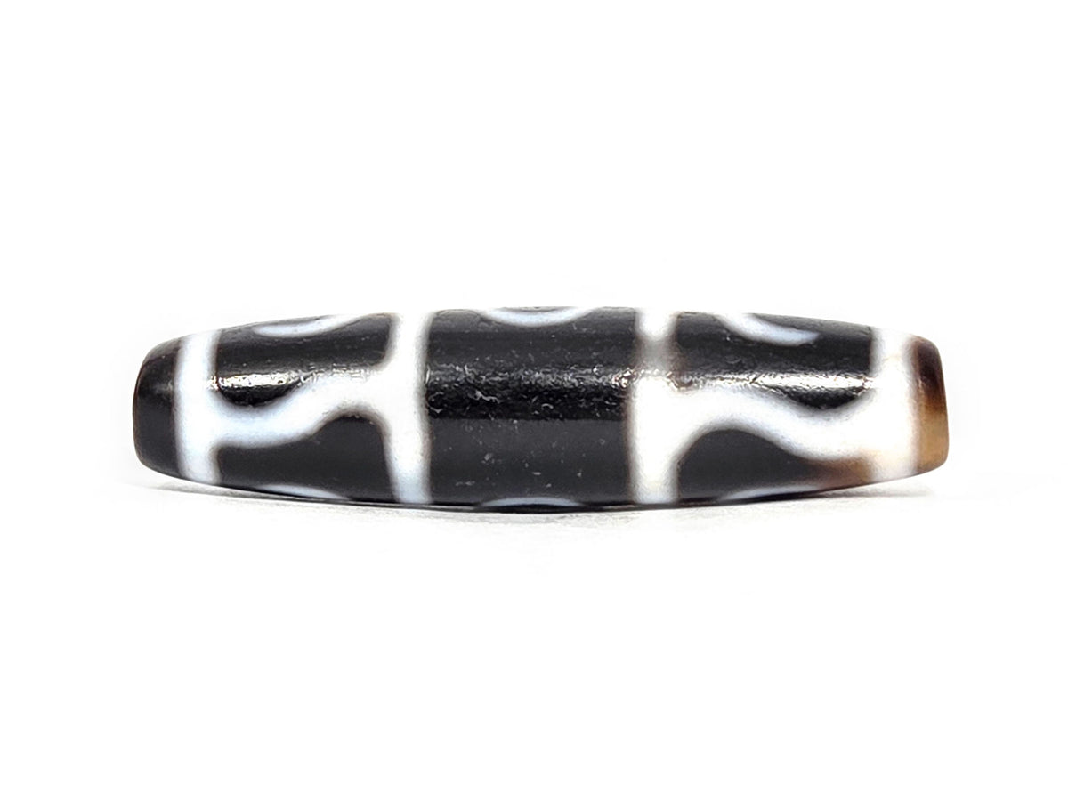 At-071426-GRS Guru Rinpoche Scepter face B — three-arch wave reverse composition, pitch-black ground, unretouched.