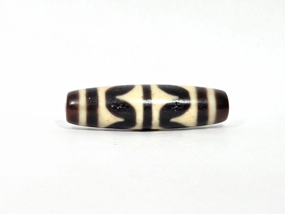 At-090226-DW9 antique double wave dzi 41.6×11.6mm dark brown black agate face A wave arcs, unretouched