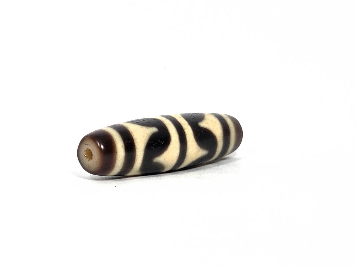At-090226-DW9 antique double wave dzi dark brown black agate angled drill end warm brown cap, unretouched