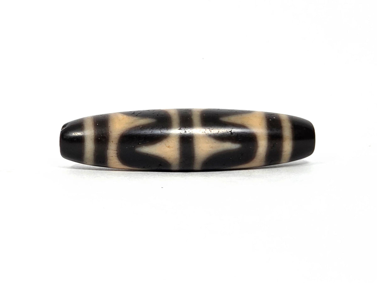 At-090226-DW7 antique double wave dzi black agate face B wave composition drill ends visible, unretouched
