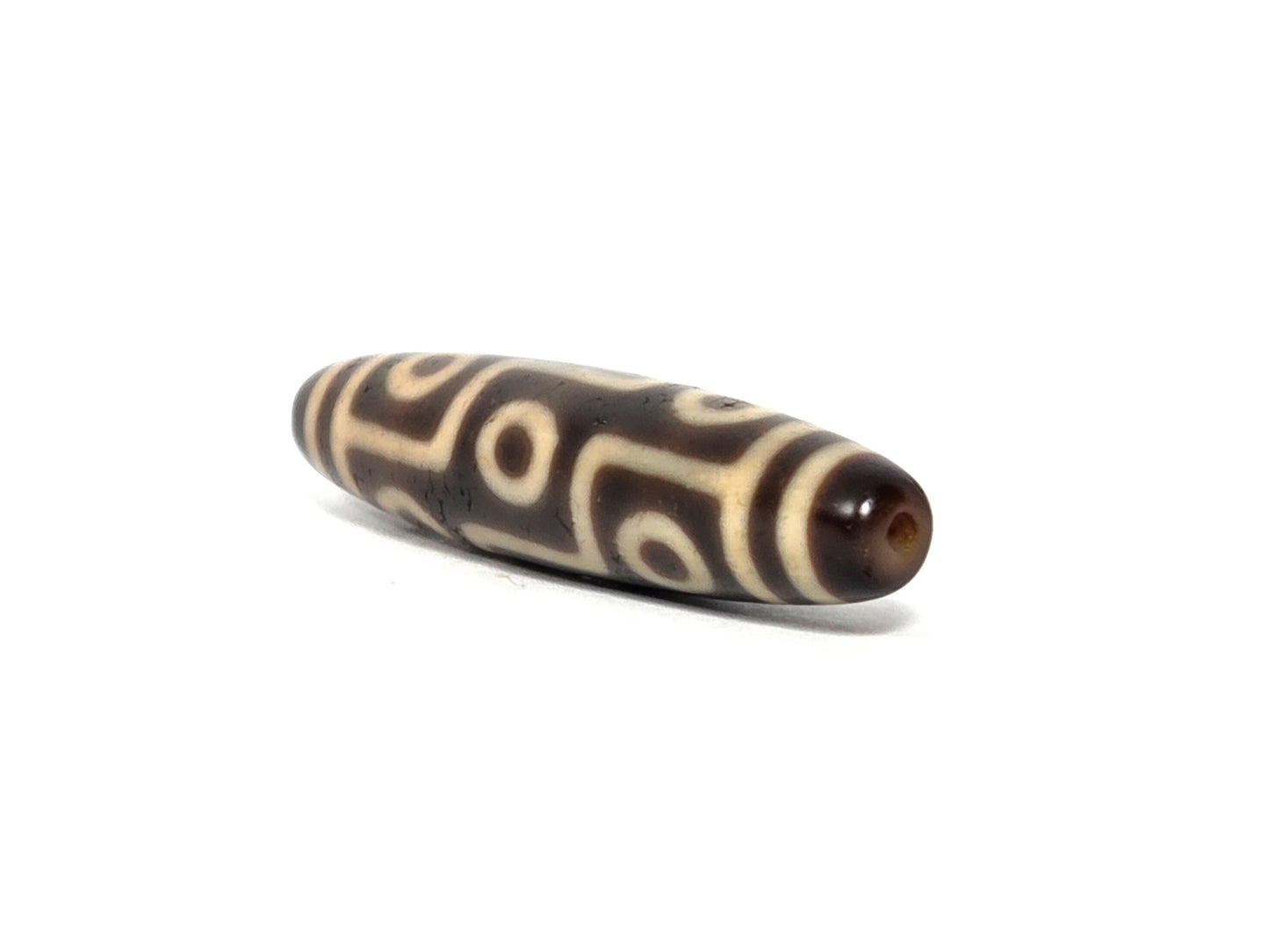 At-090326-9E antique nine eye dzi dark brown agate angled opposite drill end eye grid detail, unretouched