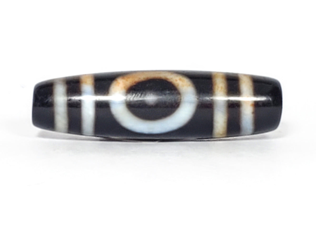 Antique dzi bead black agate heaven earth gate motif white circle stripes brown bloodspots aged patina drilled