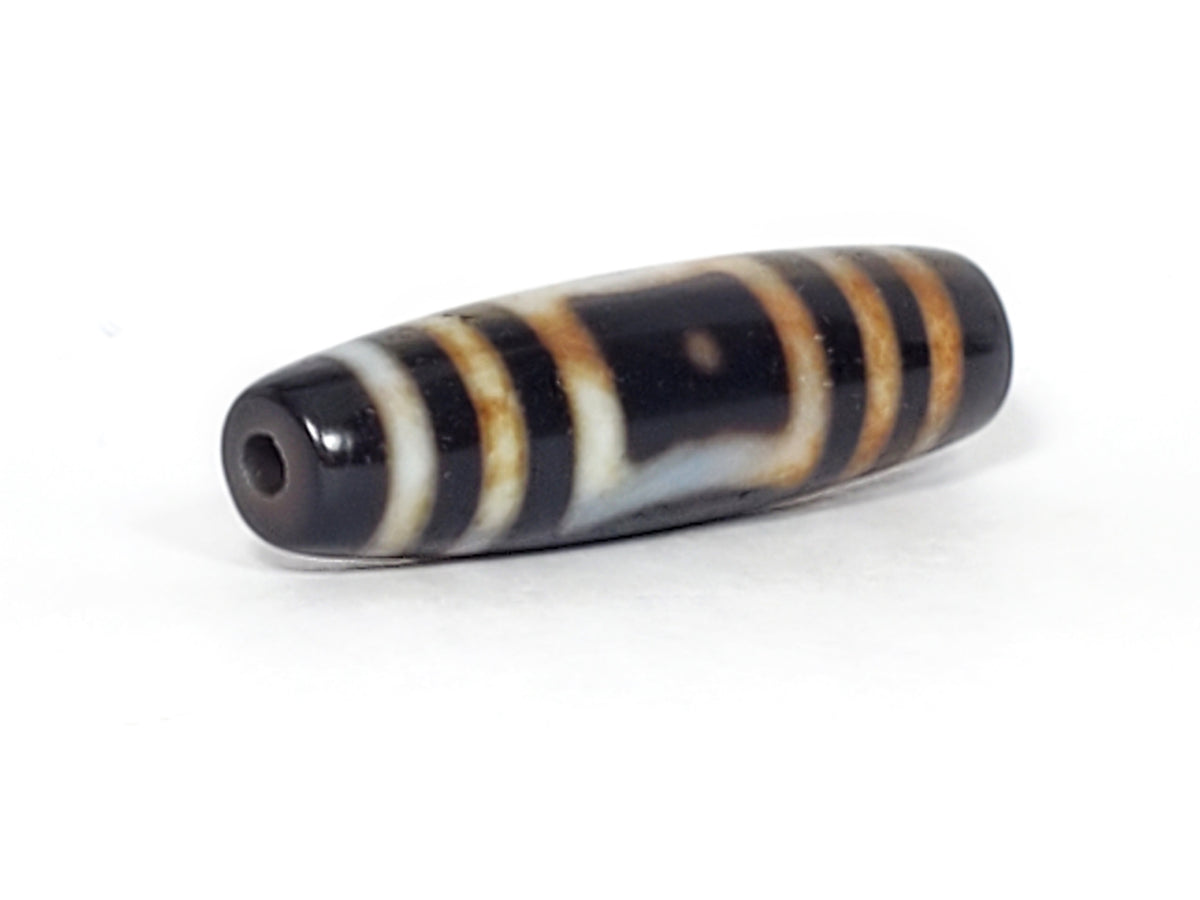 Antique dzi bead Heaven's Gate Earth's Gate motif, black white agate stripes, bloodspots, patina, visible drill hole