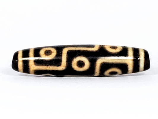 The Nine-Eye Dzi Bead: Symbolism and Significance