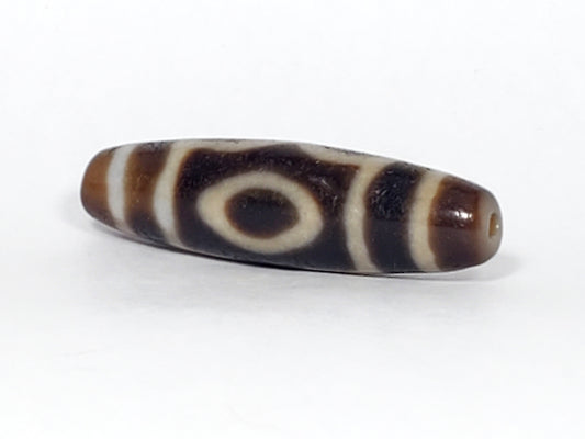 The Three-Eye Dzi Bead: Symbolism and Significance