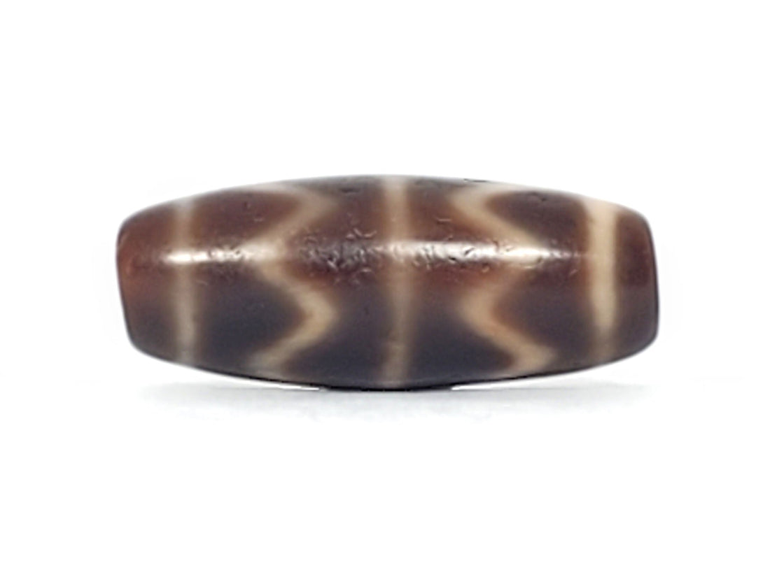 Antique Tibetan double tiger tooth dzi bead in brown agate with cream zigzag points and weathered surface, At-102524-DTT, unretouched