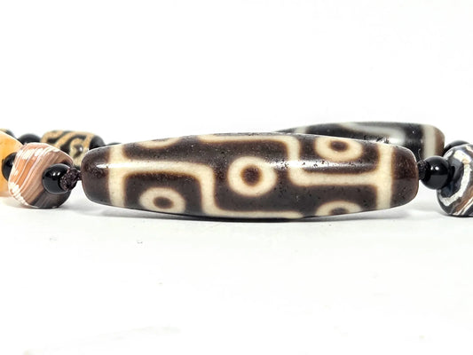 Ancient Tibetan Nine Eye Dzi bead — the King of All Dzi Motifs — Ancient Dzi Shop