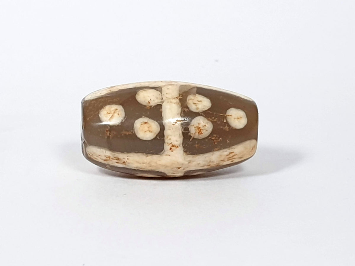 Ac-062426-18S Bead A medium warm brown ground star dots cross divider rust-brown mineral staining unretouched