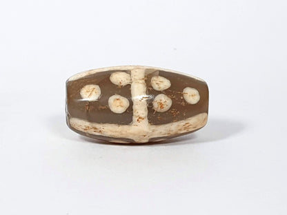Ac-062426-18S Bead A medium warm brown ground star dots cross divider rust-brown mineral staining unretouched