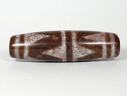 N-062126-DW dzi bead, opposite side profile, full chevron pattern visible, unretouched