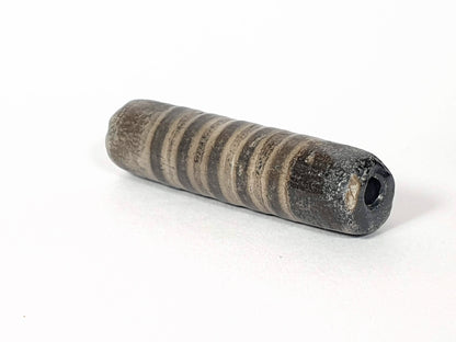 Ac-080420-19SChung, Bead A left end, blue-green burial mineral crust at drill hole, ancient cylindrical body, unretouched
