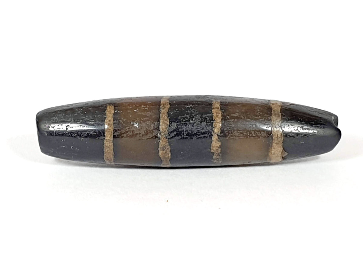 Ac-081020-7SChung ancient seven stripe Chung dzi, 49.4×11.9mm, Face A, golden-tan bands, near-pitch-black, unretouched