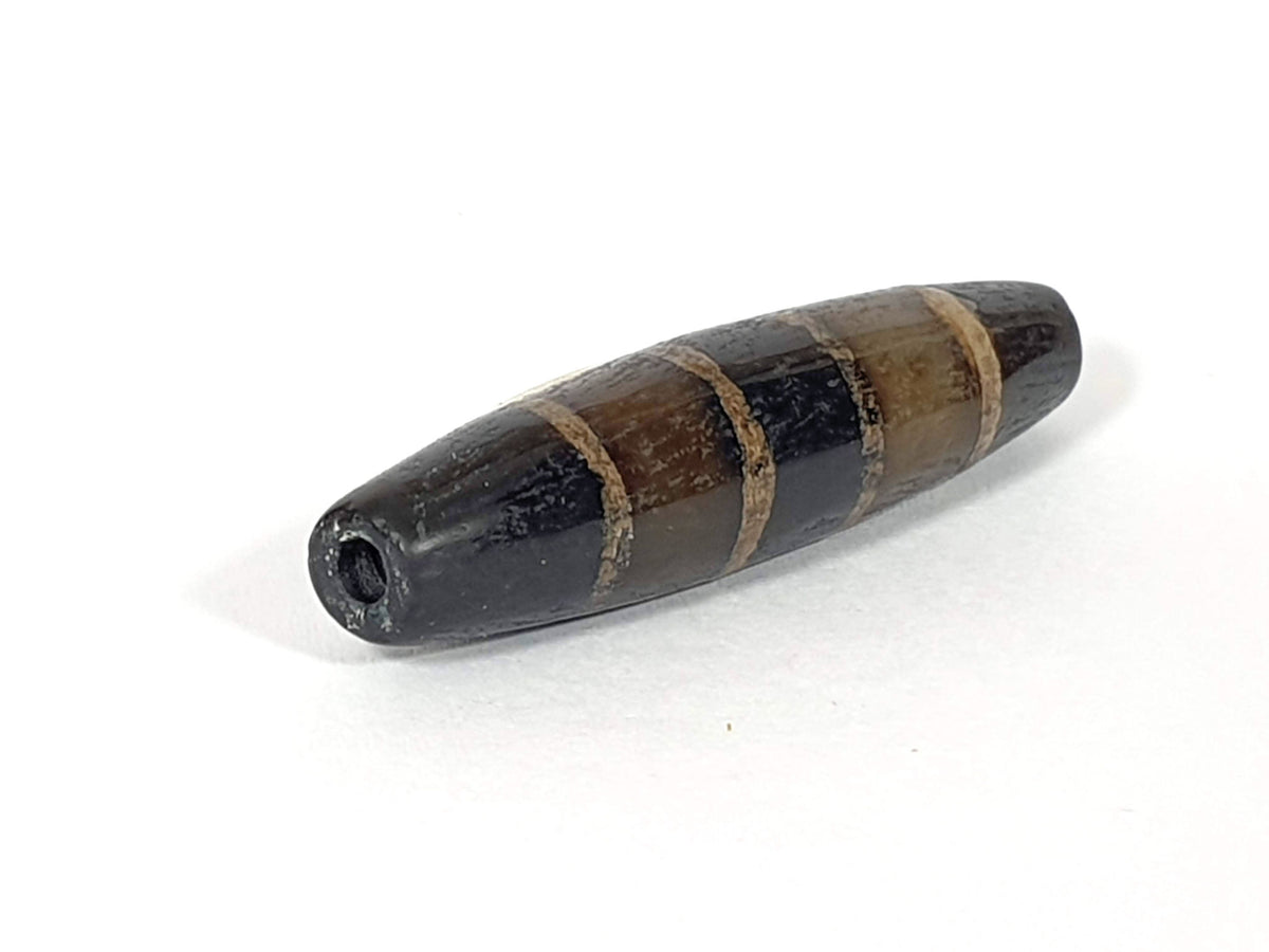 Ac-081020-7SChung ancient seven stripe Chung dzi, right end, ancient enlarged drill hole, near-pitch-black tip, unretouched