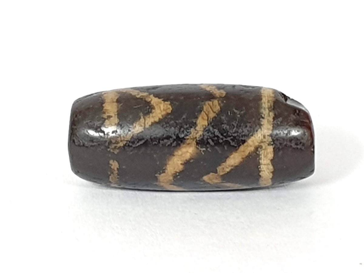 Ac-071026-CBEV2 ancient beveled carnelian vivid internal banding wave pattern face B chipping visible unretouch