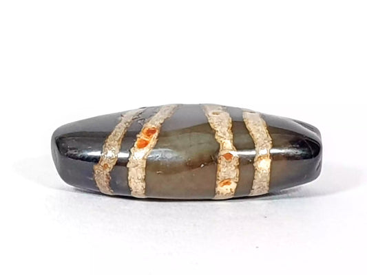 odd shaped ancient seven stripe chuing dzi