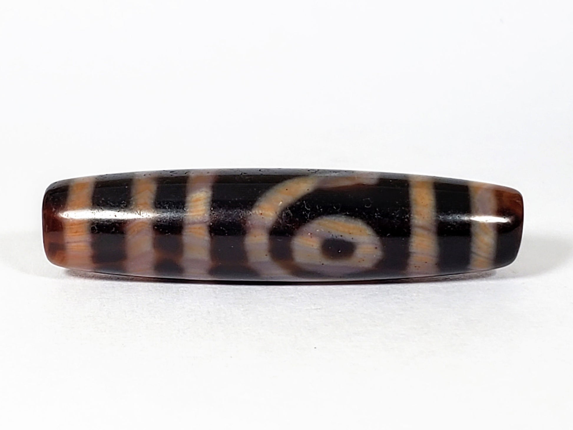 At-041521-2EBS face B open C-ring eye honey-golden-orange stripe bands deep near-black dzi unretouched