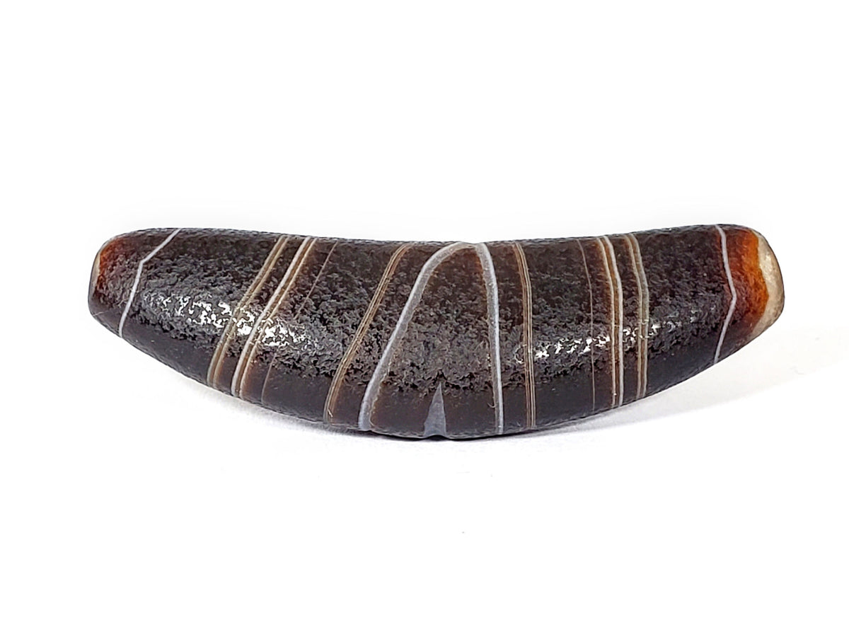 Bow-shaped natural banded agate dzi bead with striped bands and burnished patina