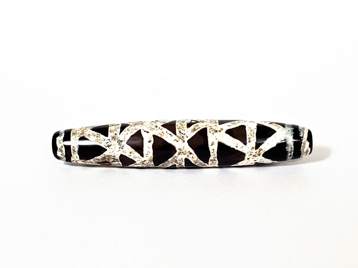 Ac-062426-CCX Bead A criss-cross carnelian dzi opposite end weathered cream lattice full coverage warm ground unretouched