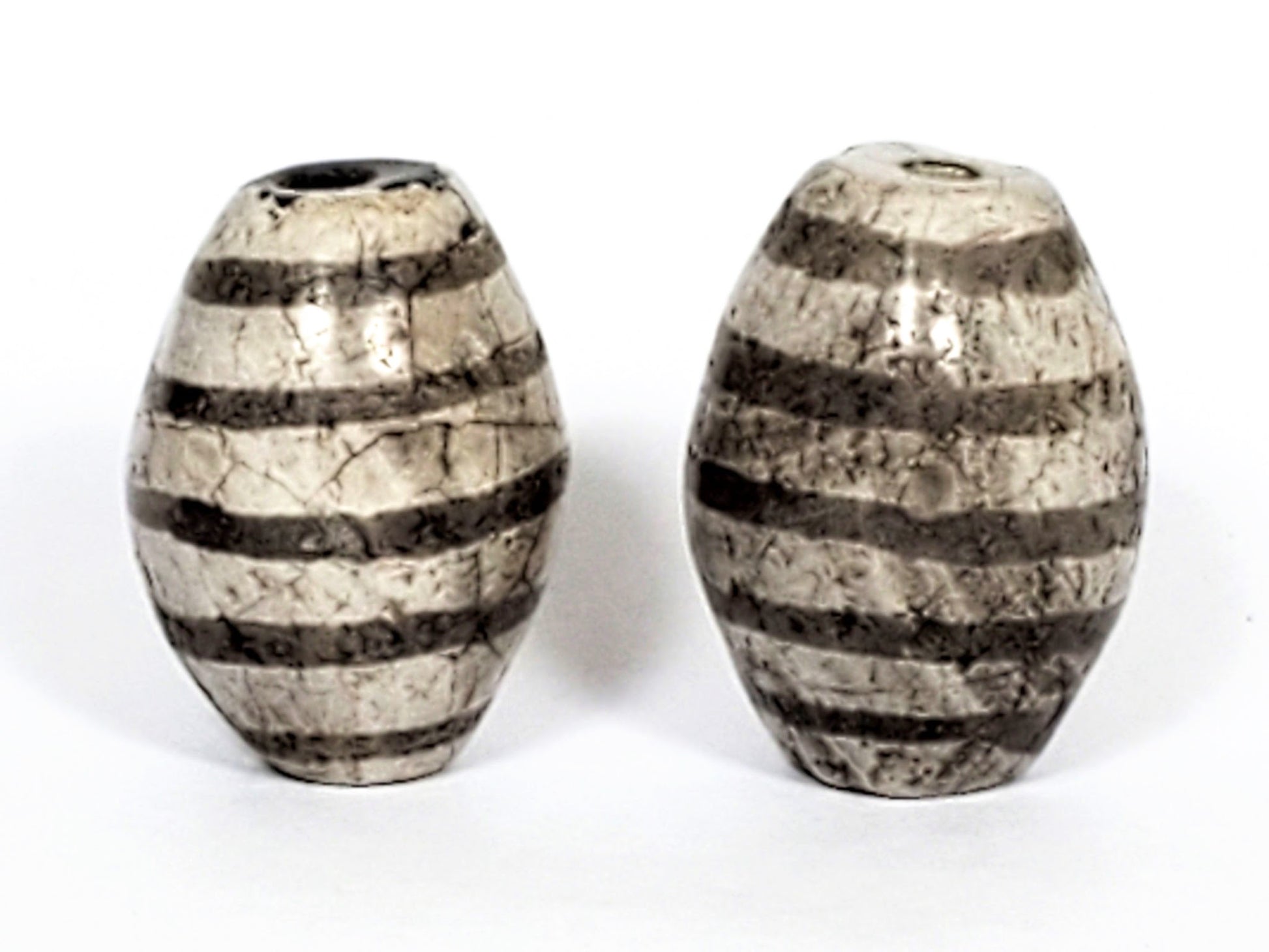Ac-062626-9SChung2 pair ancient nine stripe Chung dzi, cream-white ground, 19.8×14.7 & 20.6×15.1mm, unretouched