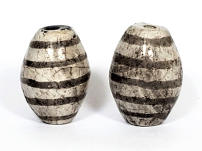 Ac-062626-9SChung2 pair ancient nine stripe Chung dzi, cream-white ground, 19.8×14.7 & 20.6×15.1mm, unretouched