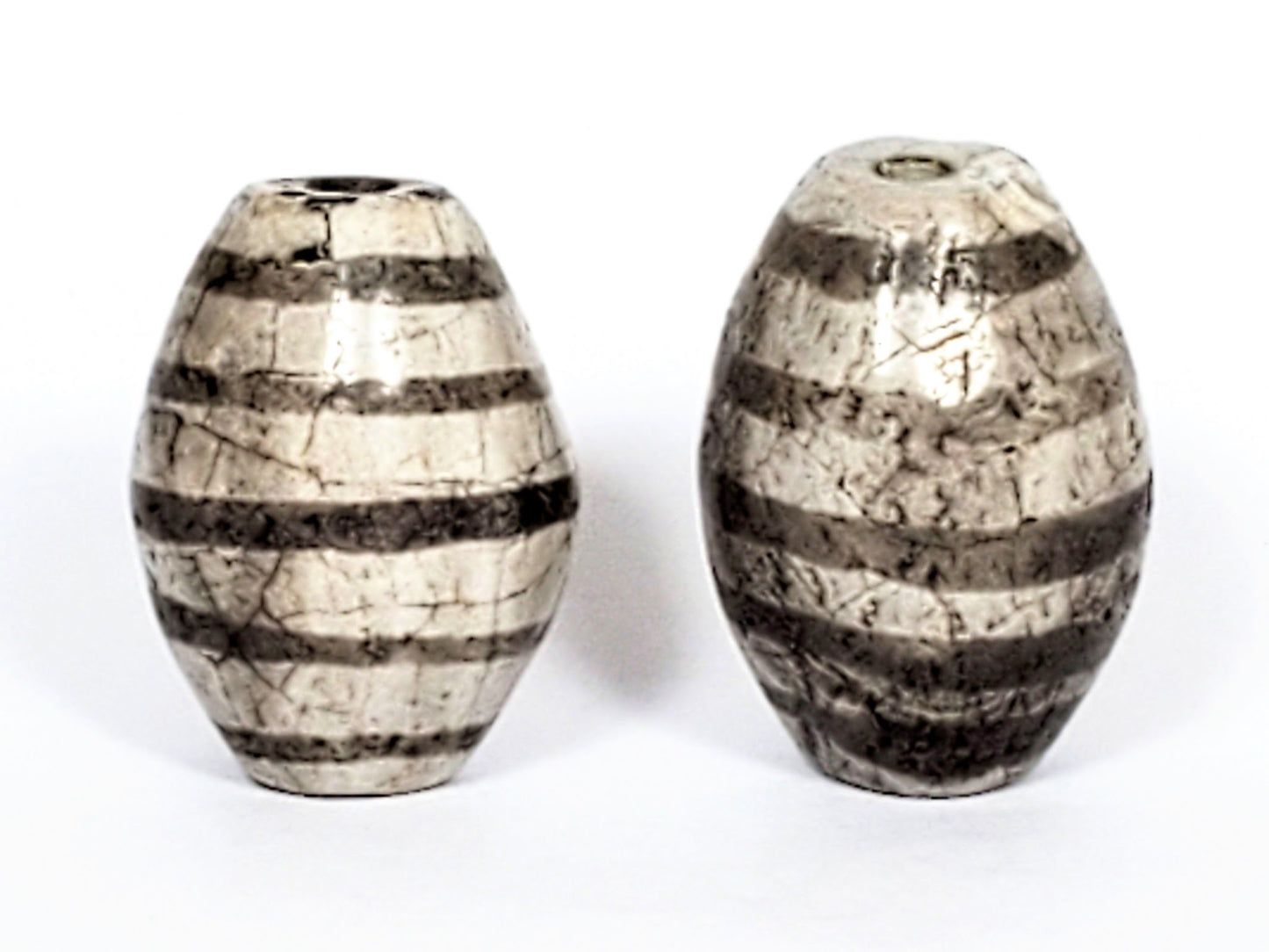 Ac-062626-9SChung2 pair ancient Chung dzi, second face view, surface crazing visible, cream-white agate, unretouched