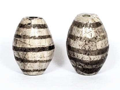 Ac-062626-9SChung2 pair ancient Chung dzi, second face view, surface crazing visible, cream-white agate, unretouched