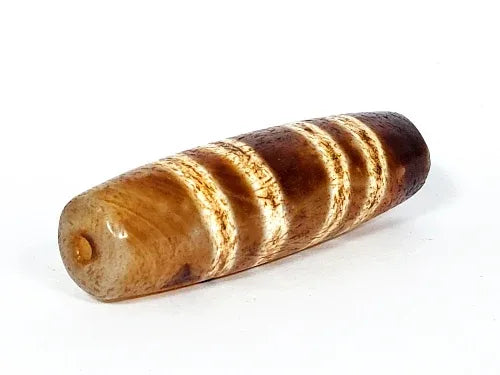 Ac-031322-7SChung, right end 3/4 view, warm honey-brown end cap, drill hole, cylindrical body girth, unretouched