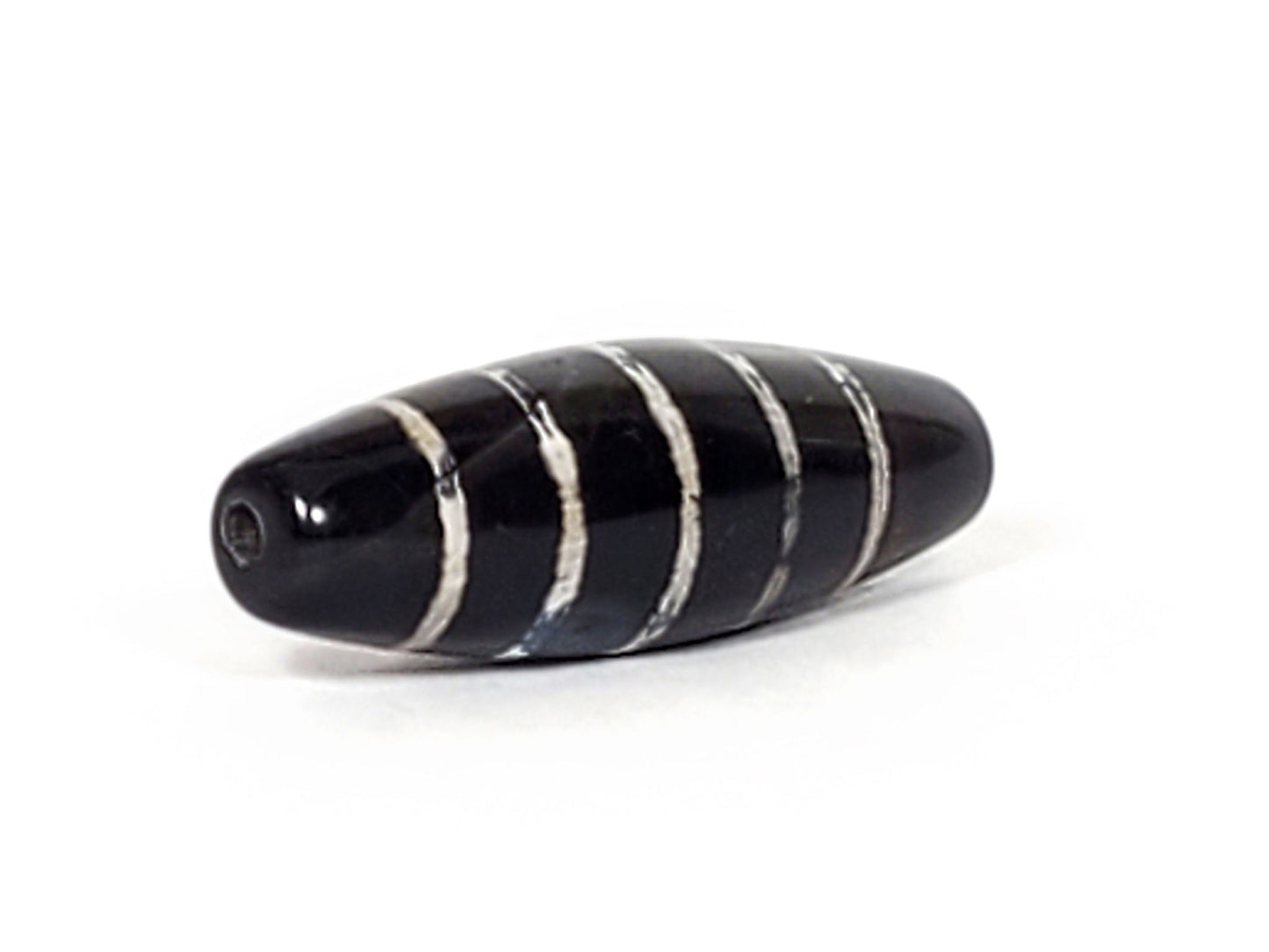 At-062626-9SChung Bead A side view, stripe line weathering detail, deep black agate, unretouched