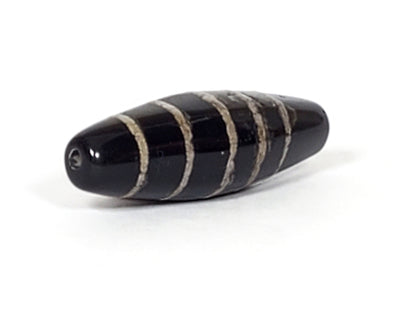 At-062626-9SChung Bead B side view, stripe texture, age-weathered edges, deep black agate, unretouched